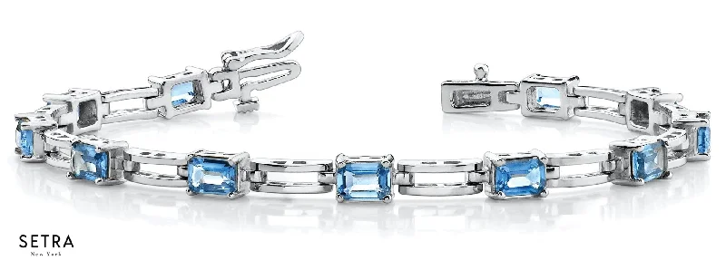 adjustable charm bracelets for women -Emerald Cut Natural Blue Topaz Women's Bridal Fancy Solid Bracelet In 14k Gold