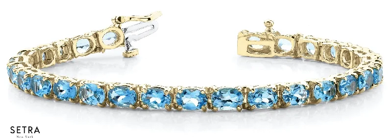 boho-style bracelets for women -Oval Cut Natural Blue Topaz Women Bridal Fancy Solid Bracelet In 14k Gold